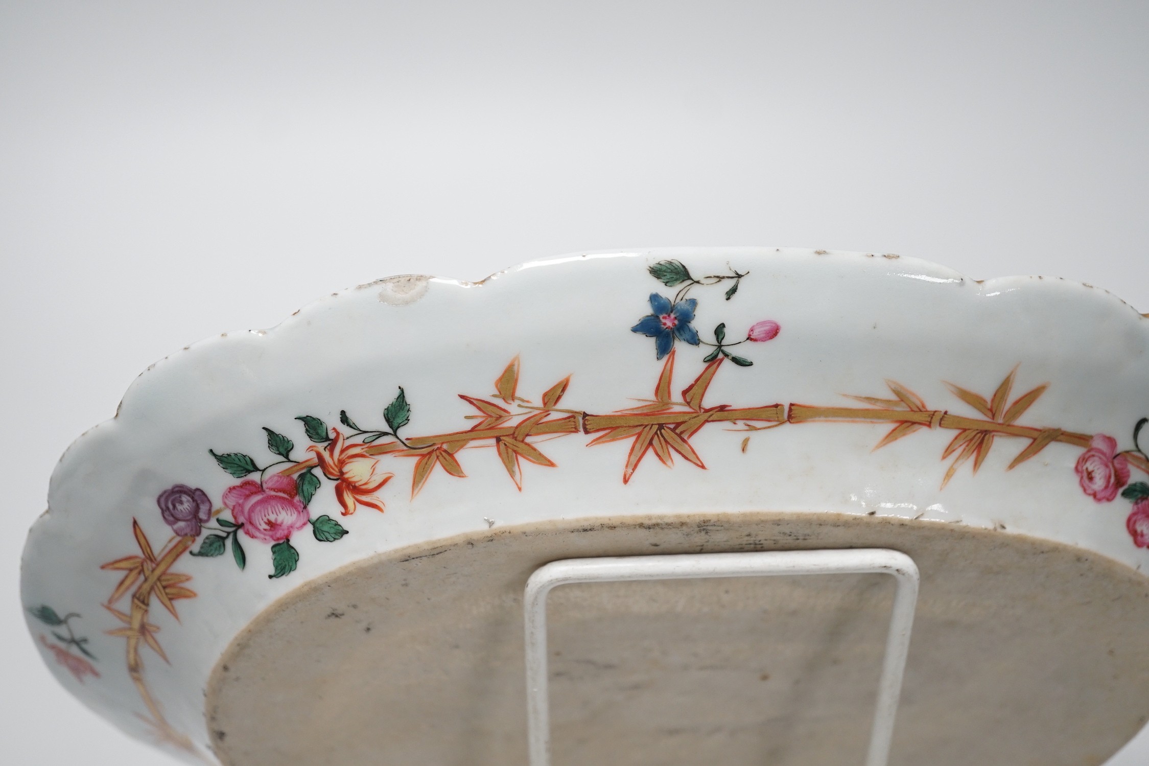 A Chinese Export pseudo armorial oval dish, c.1760, possibly of Jesuit significance, 25cms wide